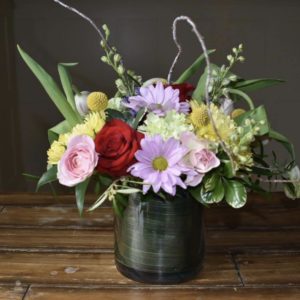bright flower variety arrangement in vase