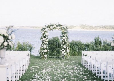 wedding arbor with greenery and flowers