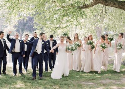 bride and groom with bridal party in a row